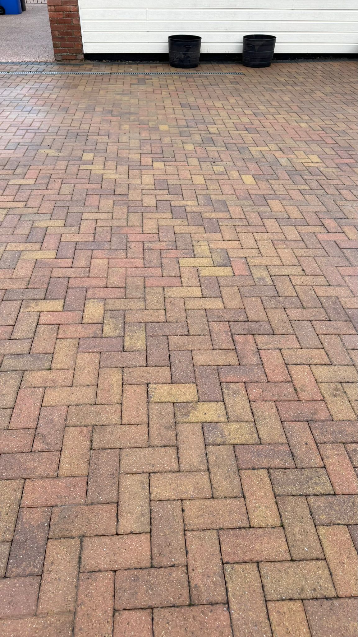 Driveway after professional pressure washing in Lowestoft